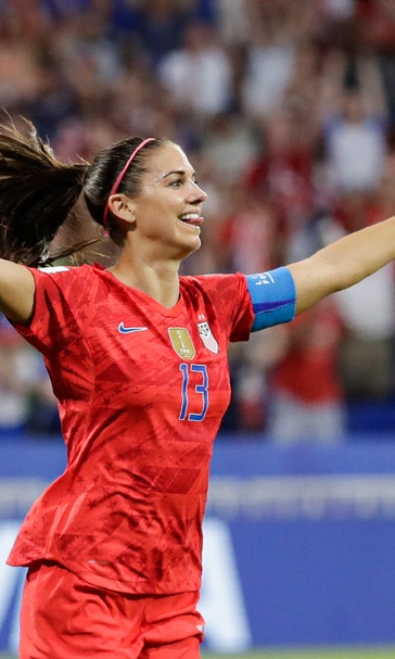 Morgan scores and Naeher saves in 2-1 victory over England.